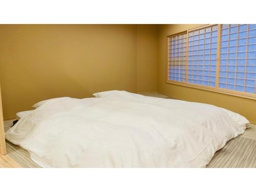 Katil atau katil-katil dalam bilik di Unazuki Onsen Sanyanagitei - Vacation STAY 06406v