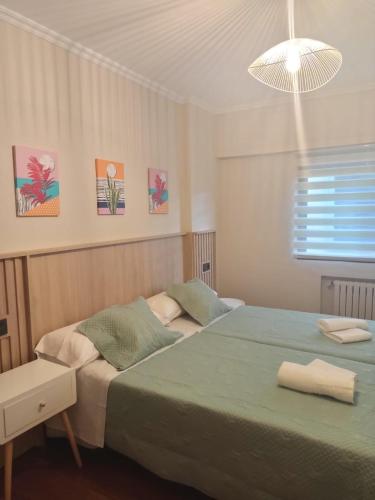 Giường trong phòng chung tại Casa andaina