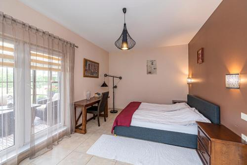 Katil atau katil-katil dalam bilik di Calm and private apartment by Polo Apartments