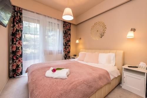 Ένα ή περισσότερα κρεβάτια σε δωμάτιο στο Szabi Buda New Terrace