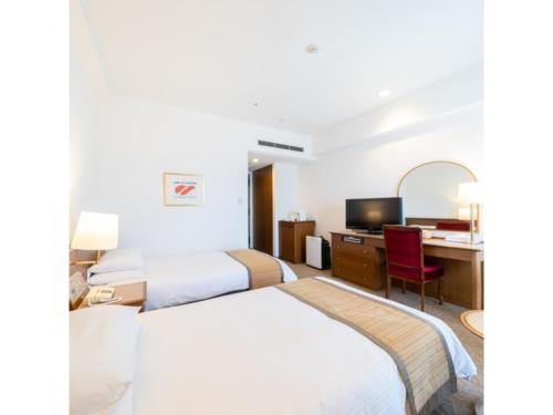 Posteľ alebo postele v izbe v ubytovaní Hotel Terrace The Square Hitachi - Vacation STAY 17023v