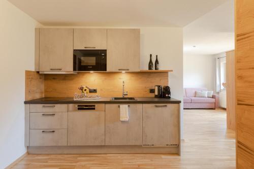 Appartements SonnAlmにあるキッチンまたは簡易キッチン