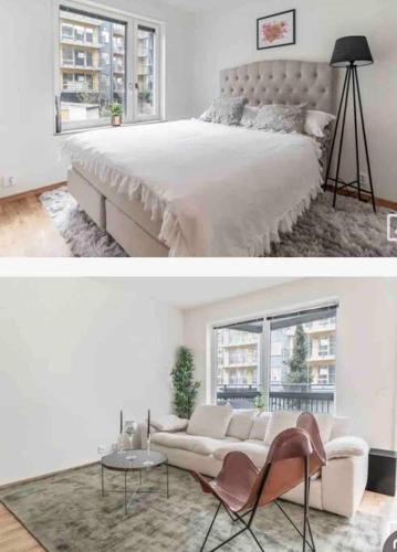 a white bedroom with a white bed and a white couch at Central apartment Uppsala in Uppsala