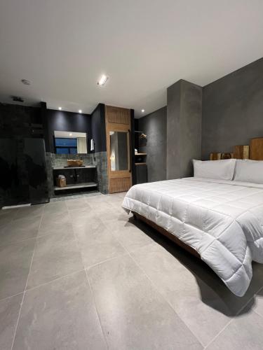 Cama o camas de una habitación en Hotel Zelva Negra
