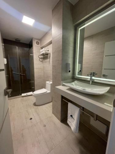 Koupelna v ubytování Grau Business Hotel
