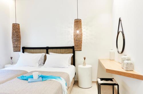 Postel nebo postele na pokoji v ubytování Skiathos Ammos Luxury Apartments