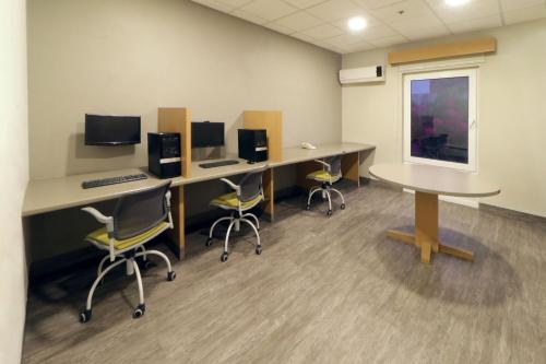 Телевизор и/или развлекательный центр в City Express by Marriott Nuevo Laredo