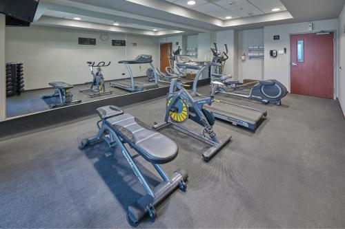 a gym with several exercise bikes in a room at City Express by Marriott Salamanca in Salamanca