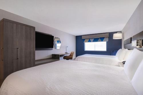 Katil atau katil-katil dalam bilik di Holiday Inn Express Hotel & Suites Moab by IHG