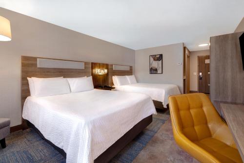 Katil atau katil-katil dalam bilik di Holiday Inn Express Hotel & Suites Moab by IHG