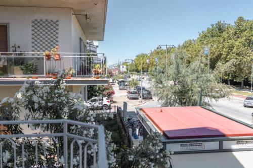 a balcony with a red roof and a street at Mare Fuori B&B in Pescara
