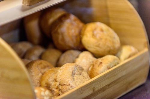 a bunch of donuts are sitting in a tray at City Express Junior by Marriott Bogota Aeropuerto in Bogotá