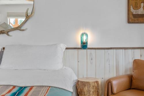 Ένα ή περισσότερα κρεβάτια σε δωμάτιο στο Hotel Palomino