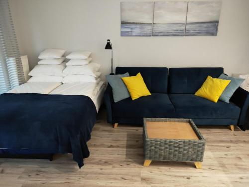 Ένα ή περισσότερα κρεβάτια σε δωμάτιο στο Apartament Studio Cafe - Baltic Park II