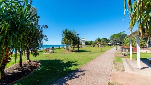 a park with the ocean in the background at Town Centre & Beach At Your Door Step in Woorim