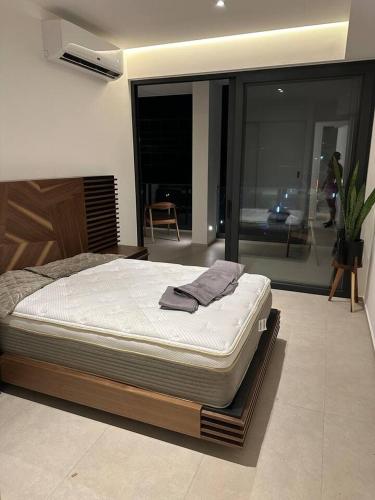 a mattress sitting on a platform in a room at 313 Paraíso frente al mar in Nuevo Vallarta