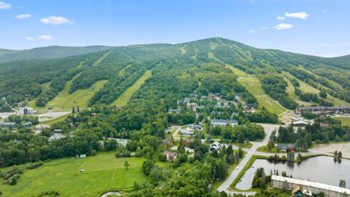 an aerial view of a small town in the mountains at Mountaineer Inn in West Dover
