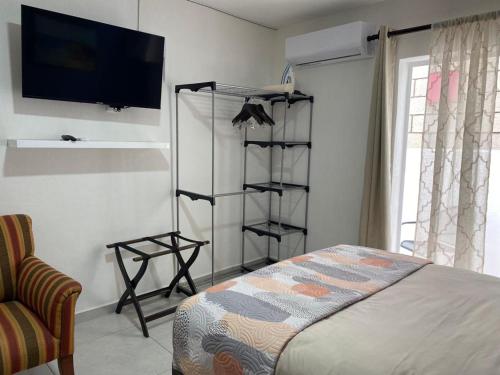 Ένα ή περισσότερα κρεβάτια σε δωμάτιο στο Estudio con Patio