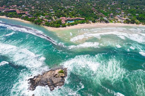 an aerial view of an island in the ocean at The Palms in Bentota