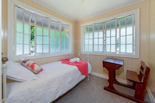 Katil atau katil-katil dalam bilik di A Charming Queenslander