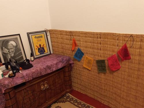 a room with towels hanging on a wall at Kasba de l'artiste in Mirleft