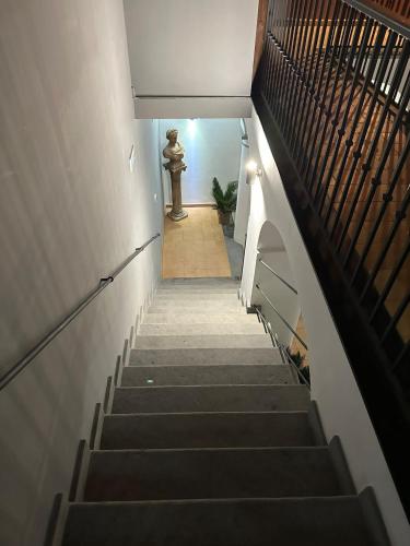 a stairway with a fire hydrant in the background at Zara Palace in Scafati