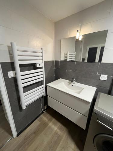 Kúpeľňa v ubytovaní Les Gites d'Albâtre, le 56