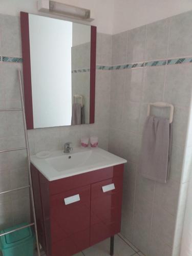 Koupelna v ubytování Les Kréol'inns chalets de Charme