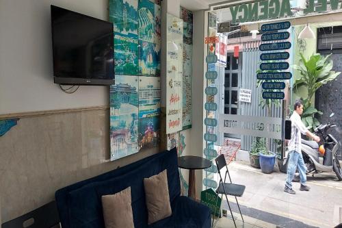 TV a/nebo společenská místnost v ubytování Ailen Hotel