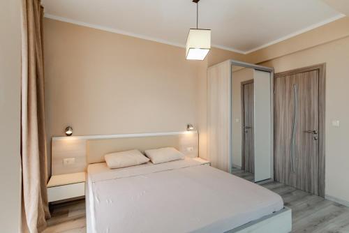 Ένα ή περισσότερα κρεβάτια σε δωμάτιο στο Budva Gate Penthouse
