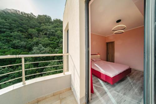 Ένα ή περισσότερα κρεβάτια σε δωμάτιο στο Budva Gate Penthouse