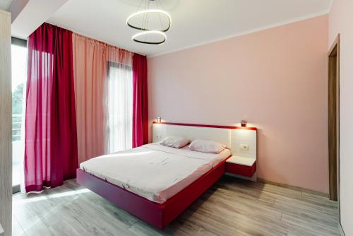 Ένα ή περισσότερα κρεβάτια σε δωμάτιο στο Budva Gate Penthouse