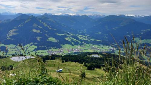 a view of a valley with mountains in the background at Appartement Wurzrainer in Westendorf