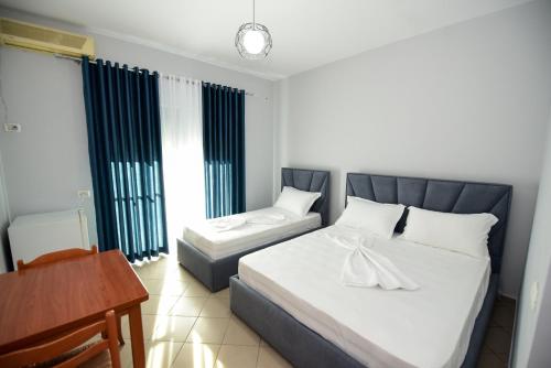 Postel nebo postele na pokoji v ubytování Koa Hotel