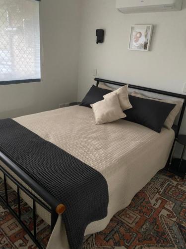 Un pat sau paturi într-o cameră la Sylvan Seas
