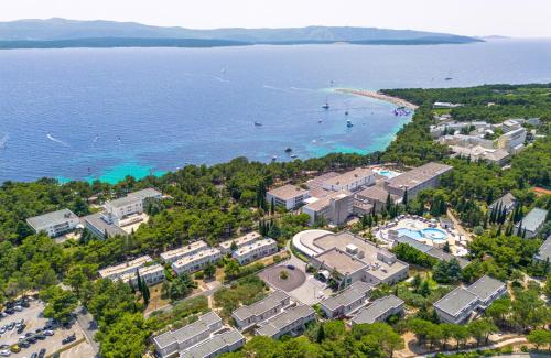 an aerial view of a resort and the ocean at Bluesun Holiday Village Bonaca - Full Board Plus in Bol