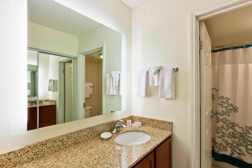 a bathroom with a sink and a shower at Residence Inn Indianapolis Fishers in Fishers