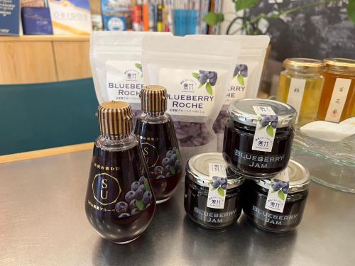 a group of three jars of jam on a table at LB1 美都津山庵別邸Bitotsuyama-an Bettei in Tuyama