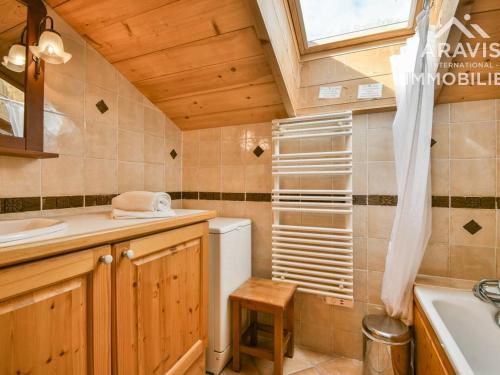 a small bathroom with a sink and a toilet at Appartement Le Grand-Bornand, 4 pièces, 8 personnes - FR-1-391-92 in Le Grand-Bornand