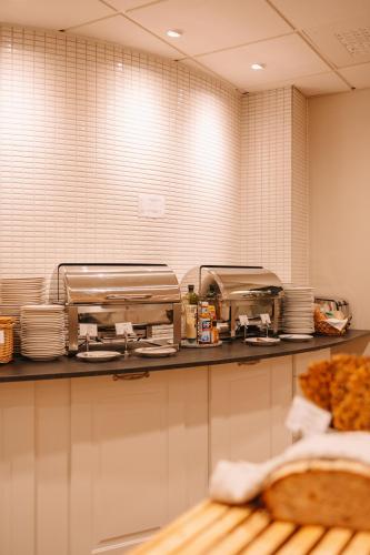 Una cocina o zona de cocina en Hotel Lorensberg