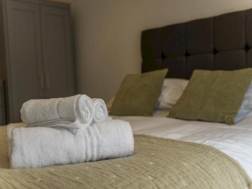 Säng eller sängar i ett rum på Pass the Keys Stunning Apartment with Terrace