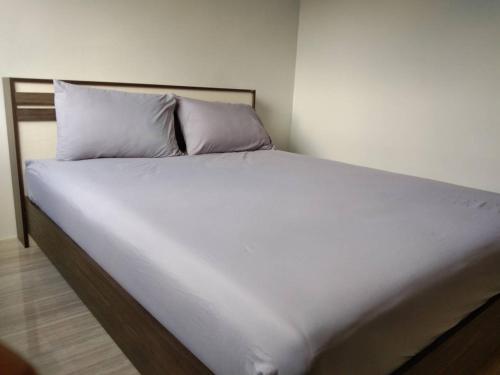 Кровать или кровати в номере Ban Saket