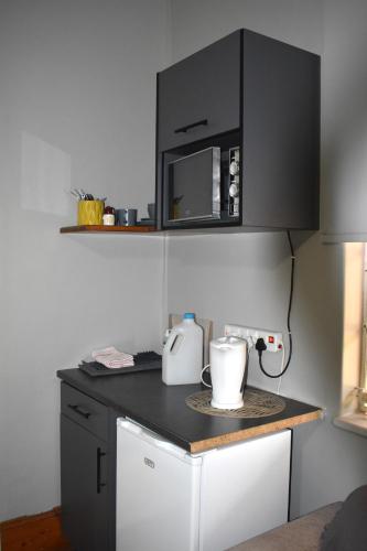 Kuchyň nebo kuchyňský kout v ubytování Padlangs Self-catering flats