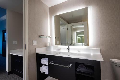 a bathroom with a sink and a mirror at Residence Inn by Marriott Wenatchee in Wenatchee