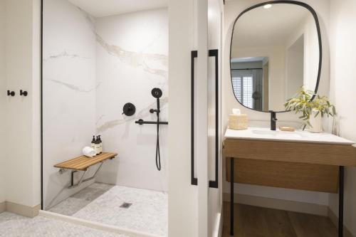 a bathroom with a shower and a sink at The Steward, Santa Barbara, a Tribute Portfolio Hotel in Santa Barbara