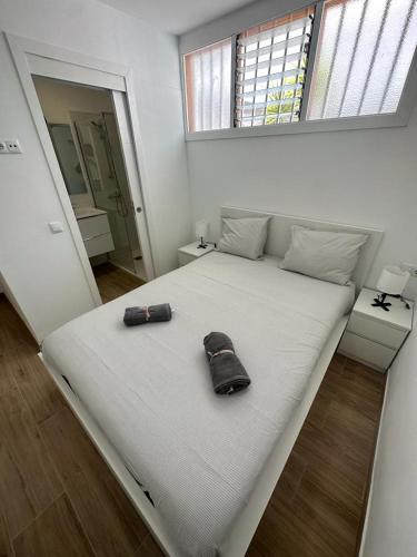 Ένα ή περισσότερα κρεβάτια σε δωμάτιο στο Antonio Apartment