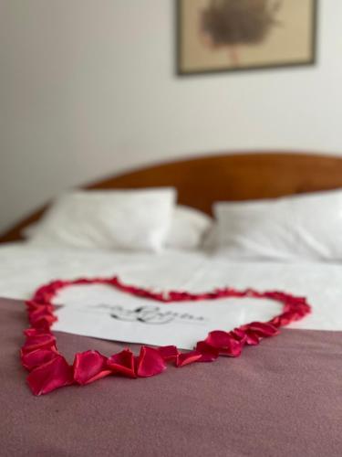 Ένα ή περισσότερα κρεβάτια σε δωμάτιο στο Park Hotel