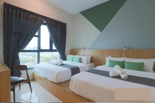 two white beds in a room with a window at Melaka Town/Sea View/10 min to Jonker/4-6Pax(2015) in Melaka