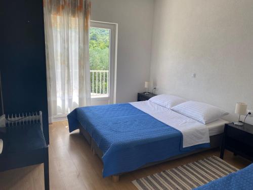 Postel nebo postele na pokoji v ubytování Happy Day
