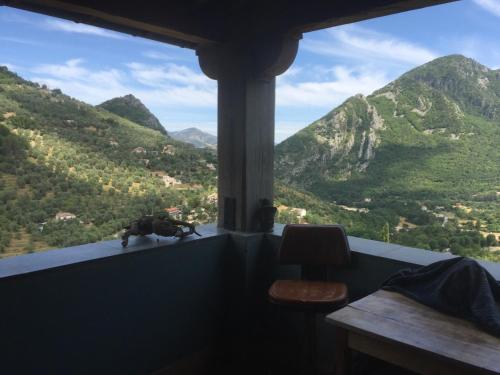 a balcony with a view of a mountain at Eco Chalet avec Grande Terrasse in Sospel